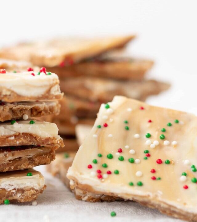 Biscoff White Chocolate Saltine Toffee | kickassbaker.com #biscoff #bark #holidaybaking #holidays #christmascookies #cookieexchange #whitechocolate #bakingrecipes #kickassbaker