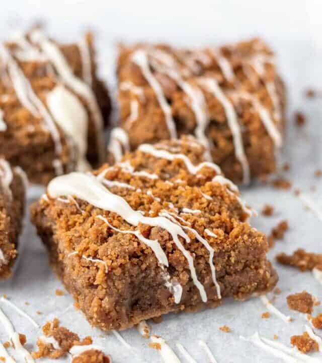 Biscoff Blondies with white chocolate drizzle | kickassbaker.com #biscoff #blondies #brownies #nutfree #recipes #baking #kickassbaker #treats