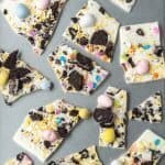 White Chocolate Oreo Easter Bark | kickassbaker.com #easter #dessert #easyrecipe #easyrecipes #nobake #oreo #whitechocolate #cadburyeggs #cadbury #bark #kickassbaker #holiday #treats #kidfriendly #nonuts #peanutfree #nutfree