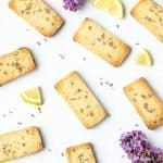 Lavender Lemon Shortbread Cookies overhead shot with flowers and lemon pieces strewn about