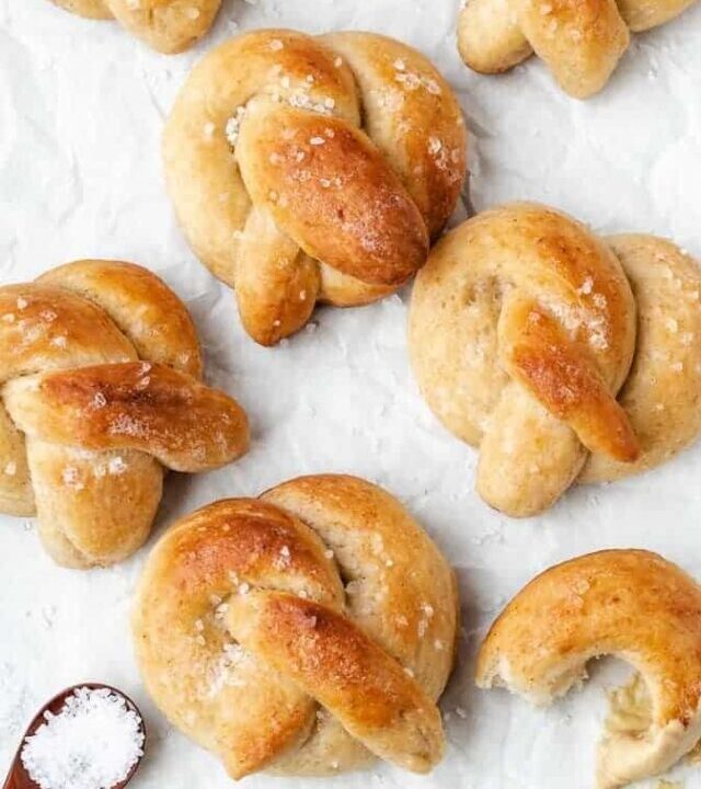 Soft pretzels on a tray with salt and mustard
