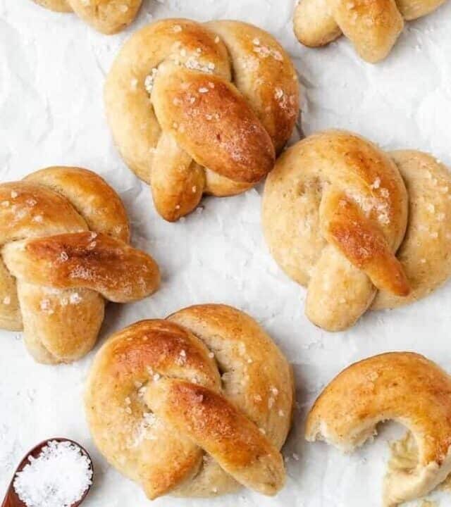 Soft pretzels on a tray with salt and mustard
