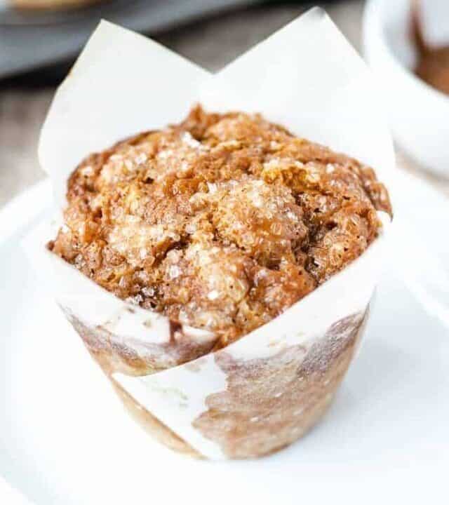 Close up shot of banana dulce de leche muffin on a white plate