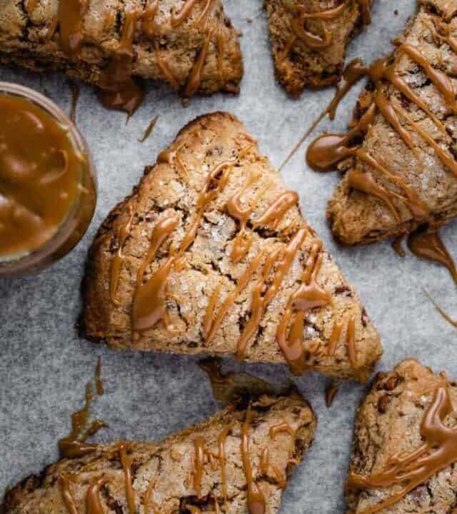 Overhead of scones drizzled with dulce de leche
