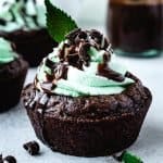 chocolate mint brownie cups with chocolate shavings and chocolate ganache as garnish