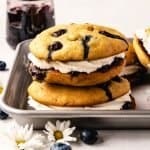 blueberry whoopee pies stacked with jam behind