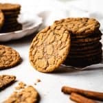 stack of brown sugar cookies with a cookie leaning against the stack