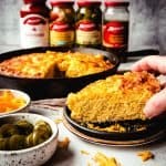 picking up a piece of jalapeño cheddar cornbread