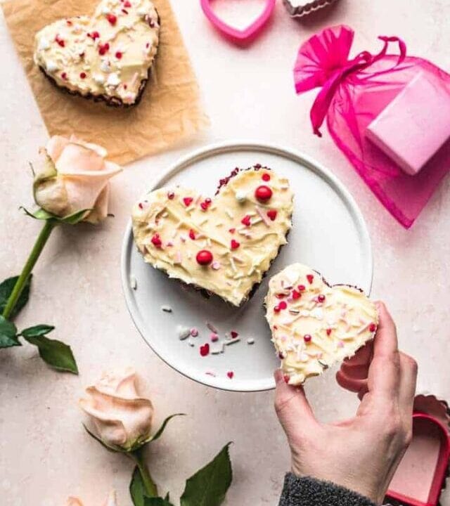 picking up a heart shaped red velvet blondie
