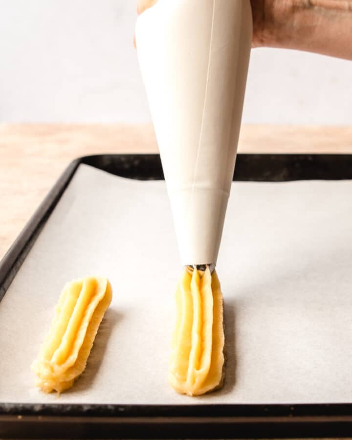 Crispy Cinnamon Sugar Oven-Baked Churros - Kickass Baker