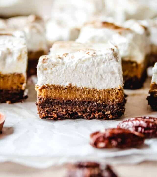 These homemade sweet potato pie bars all have a generous layer of homemade marshmallow fluff.
