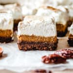 These homemade sweet potato pie bars all have a generous layer of homemade marshmallow fluff.