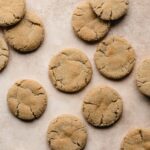 fresh baked eggless gingersnap cookies with crispy edges.