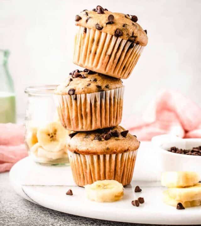 A large stack of delicious banana chocolate muffins.
