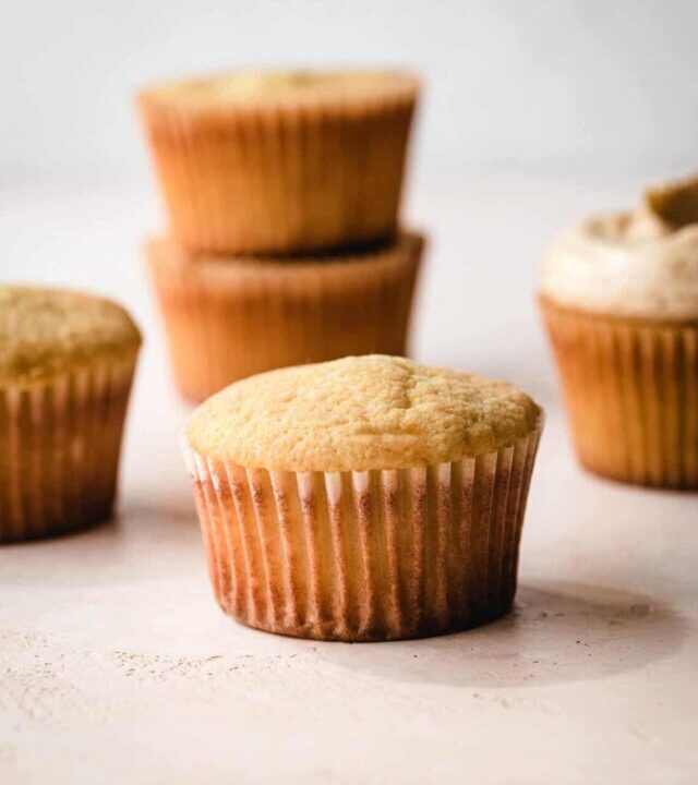 Unfrosted vanilla cupcakes.