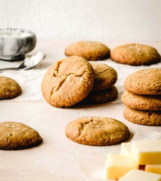 brown butter cookies stacked and leaning against each other