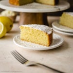 A slice of obsession worthy lemon ricotta cake on a plate.
