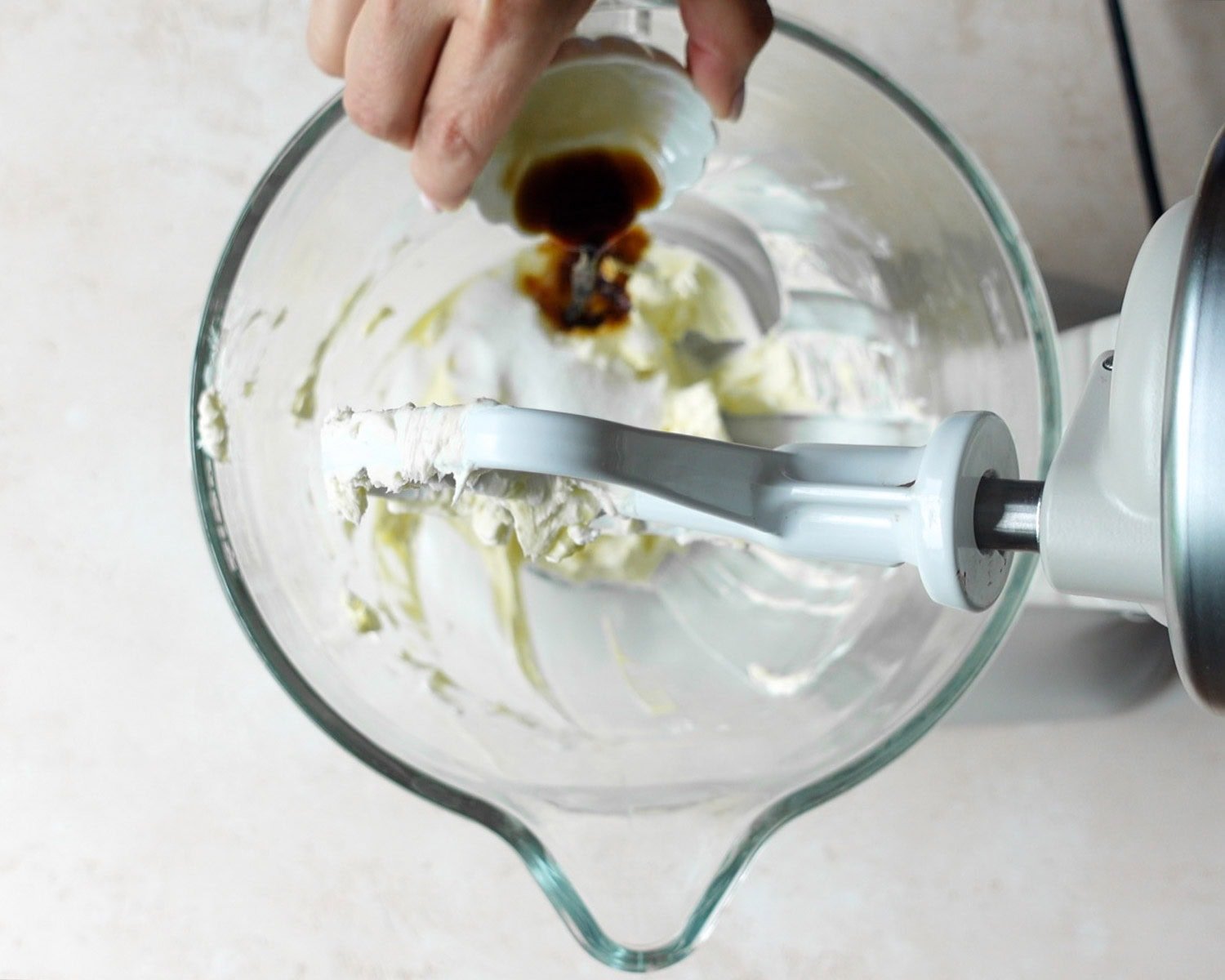 Add vanilla extract to the cream cheese mixture.