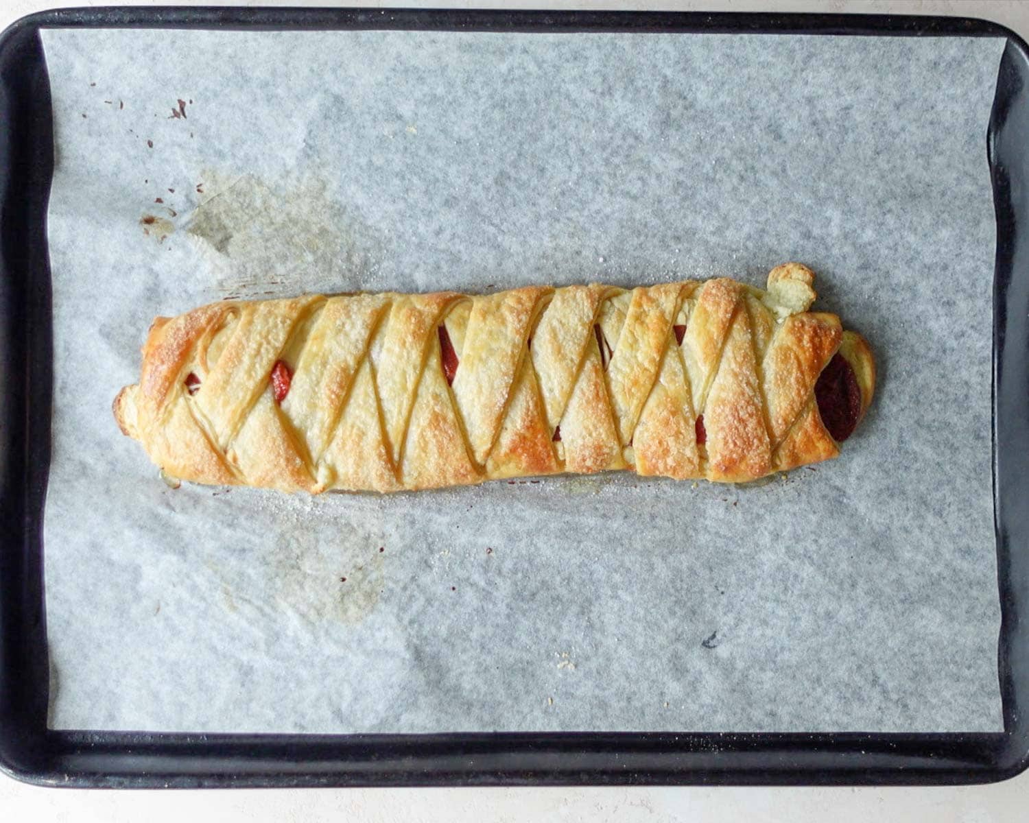 Golden brown puff pastry filled with cream cheese and guava paste.