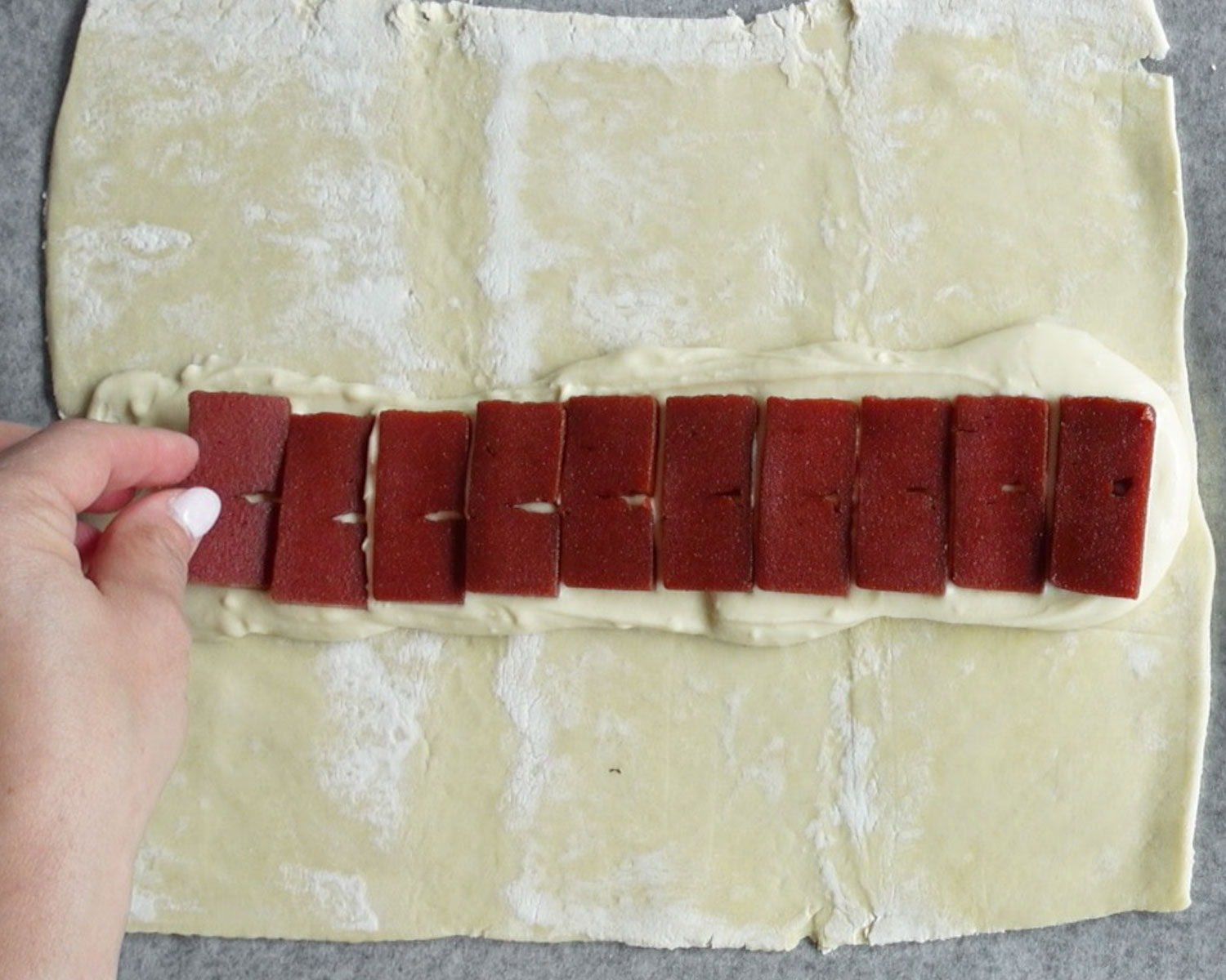 Lay thick slices of guava paste on top of cream cheese mixture.