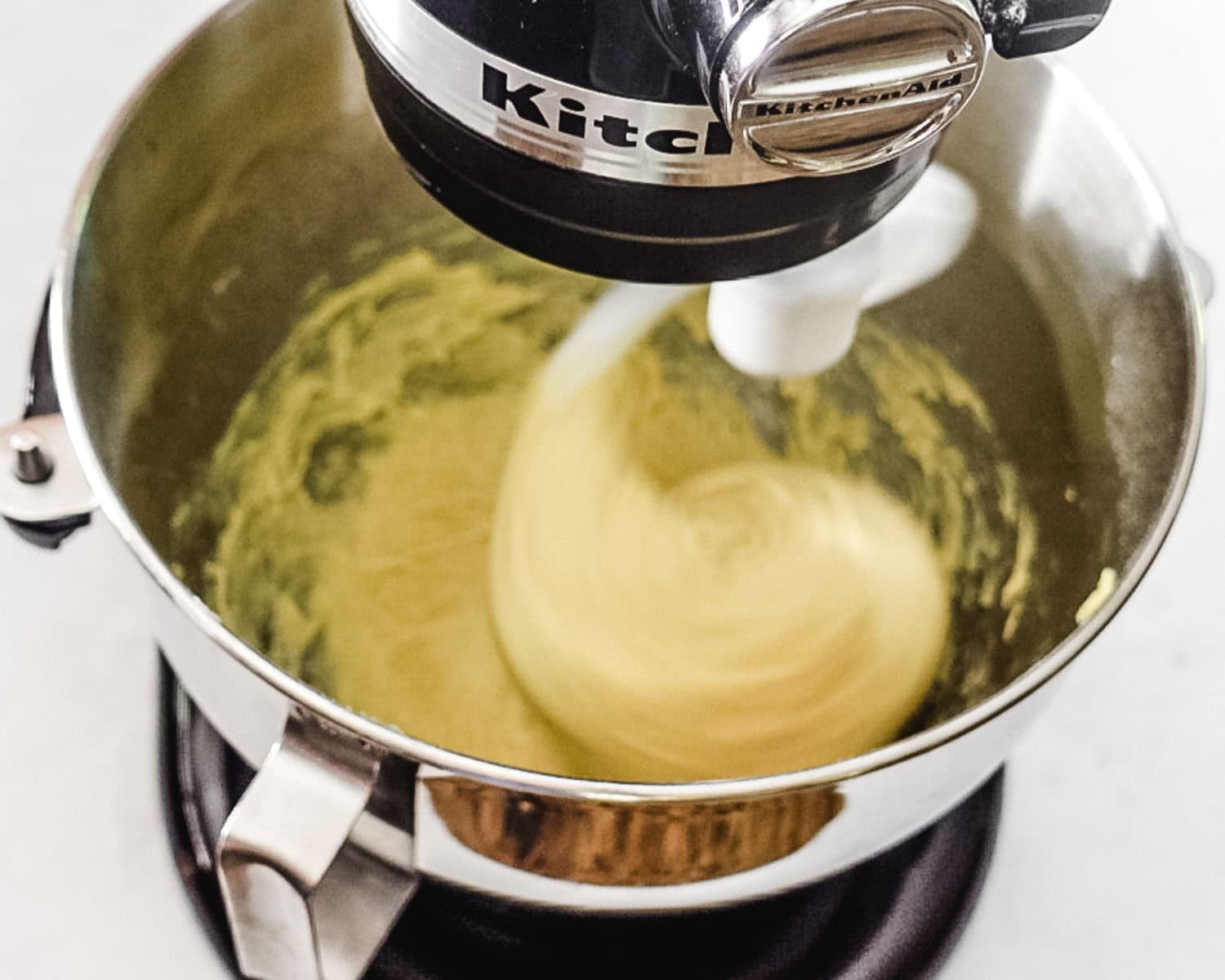 Add sugar and salt and knead for nine minutes.