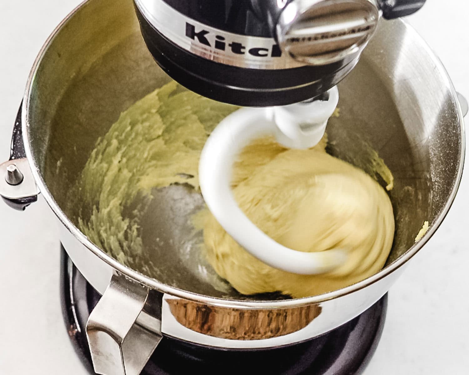 Dough should not stick to the sides of the bowl after 9 minutes.